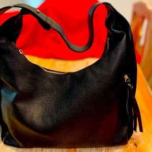 Beautiful new leather handbag in black.